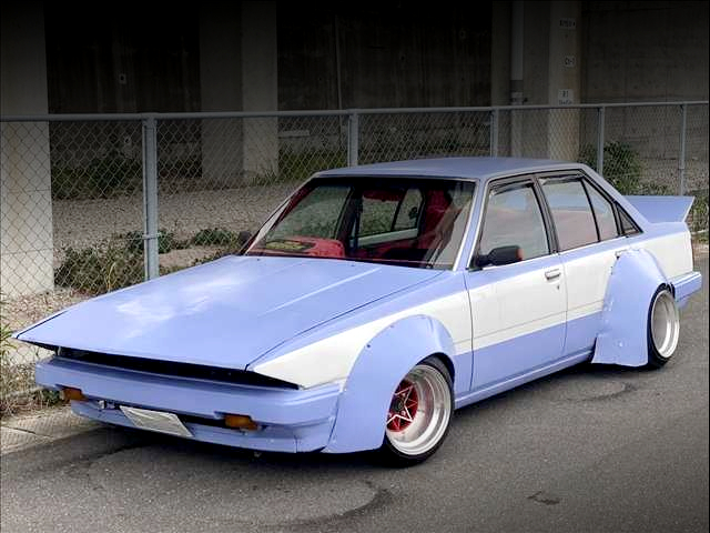 Front exterior of JDM WORKS WIDEBODY AA63 CARINA 4-DOOR.