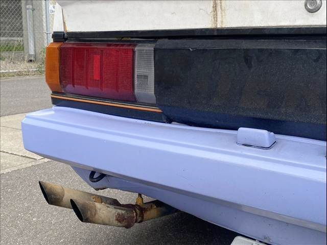 Exhaust muffler of JDM WORKS WIDEBODY AA63 CARINA 4-DOOR.