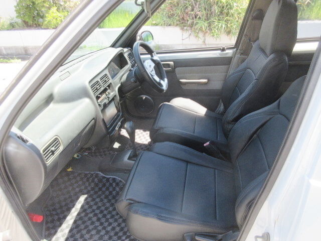 Passenger side Interior of E30 BMW faced CL22V SUZUKI ALTO HUSTLE.