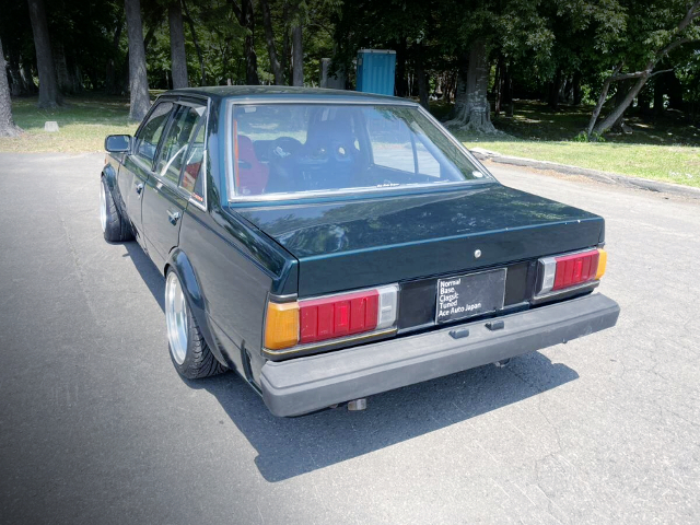 Rear exterior of AA63 TOYOTA CARINA 4-DOOR.