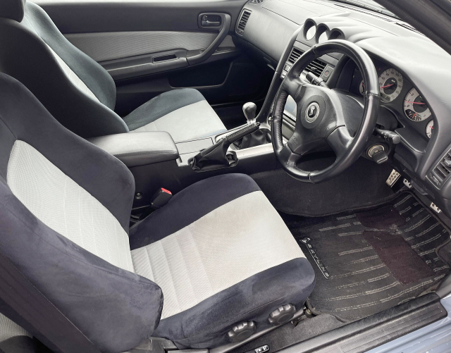 Interior of URAS WIDEBODY ER34 SKYLINE 2-DOOR.
