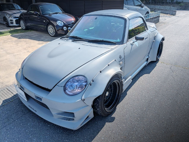 Front exterior of JB-DET With DX30KAI TURBO in the MOFAC WIDEBODY L880K COPEN ACTIVE TOP.
