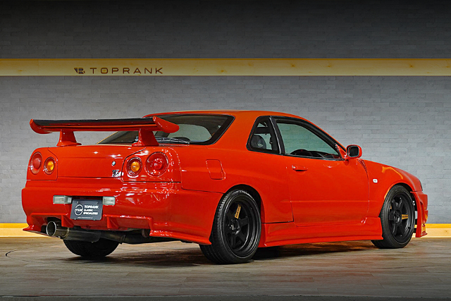 Rear exterior of Active red ER34 SKYLINE 2-DOOR 25GT TURBO.