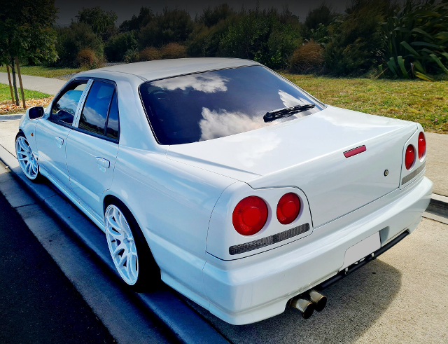 Rear exterior of R34 SKYLINE 4-DOOR GT.