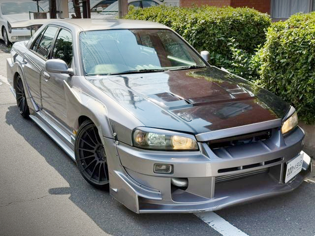 Front exterior of URAS WIDEBODY ER34 SKYLINE 4-DOOR.