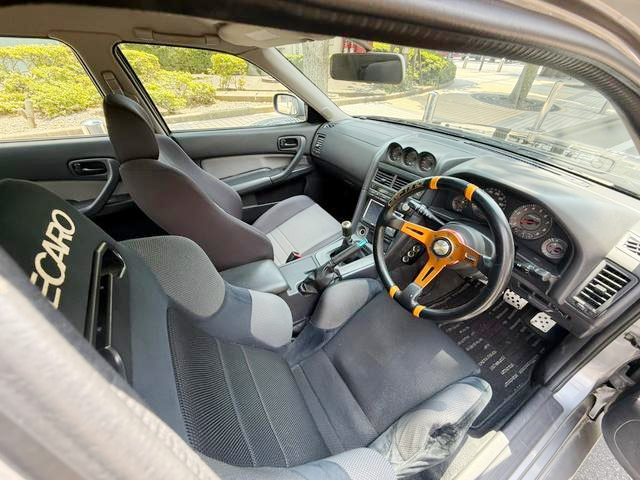 Interior of URAS WIDEBODY ER34 SKYLINE 4-DOOR.