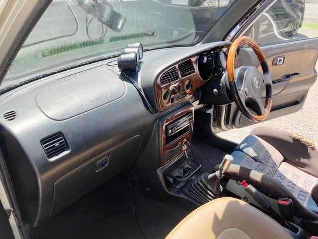 Dashboard of 1st Gen MIRA GINO.