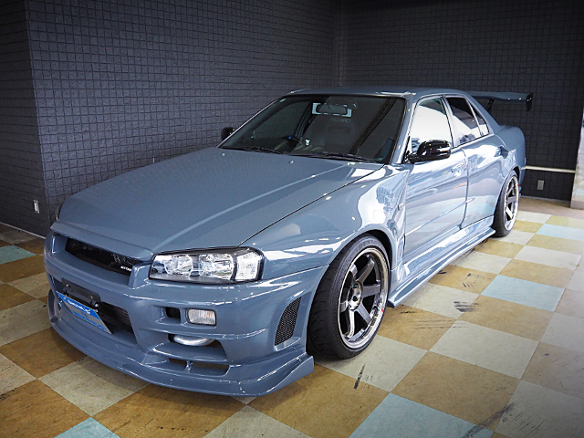Front exterior of URAS WIDEBODY ER34 SKYLINE 4-DOOR.