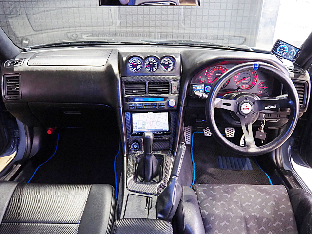 Interior of URAS WIDEBODY ER34 SKYLINE 4-DOOR.