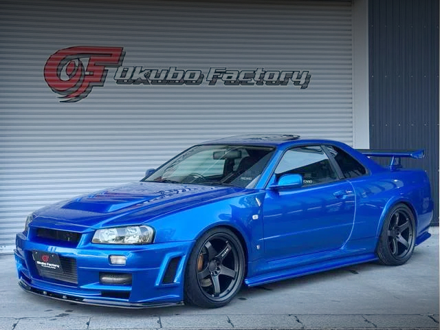 Front exterior of OKUBO FACTORY WIDEBODY ER34 SKYLINE 2-DOOR 25GT TURBO.